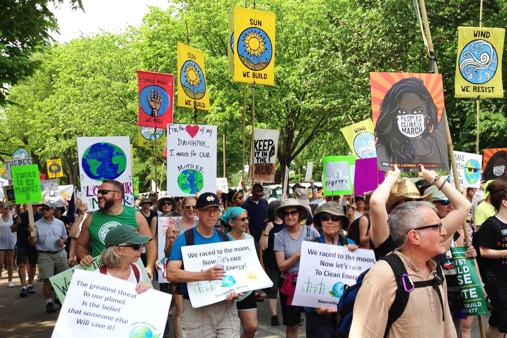 Crowd marching at climate march